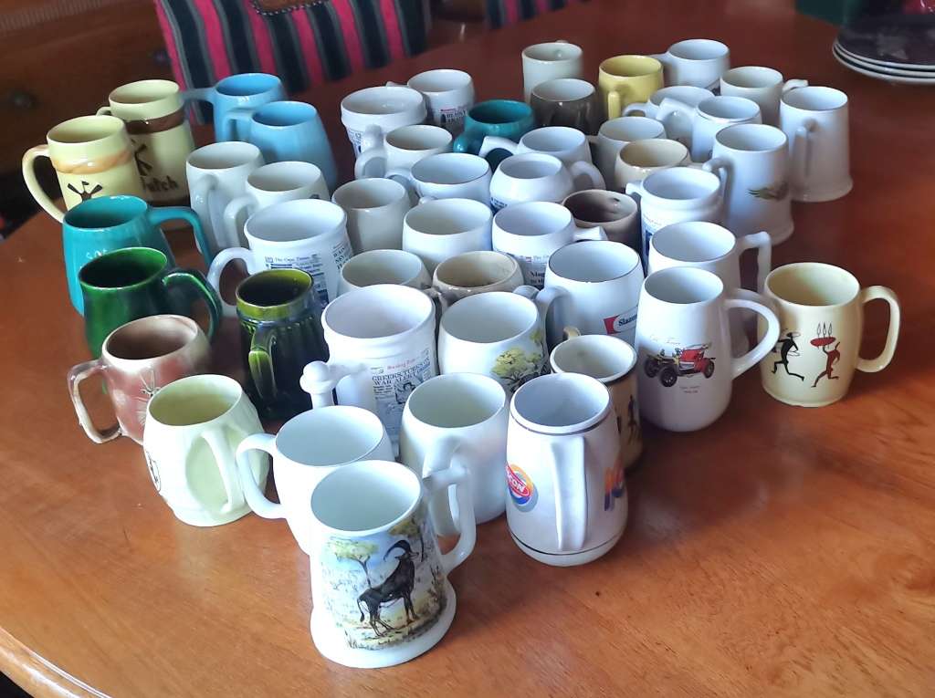 South African Porcelain Collection of vintage ceramic beer mugs. for